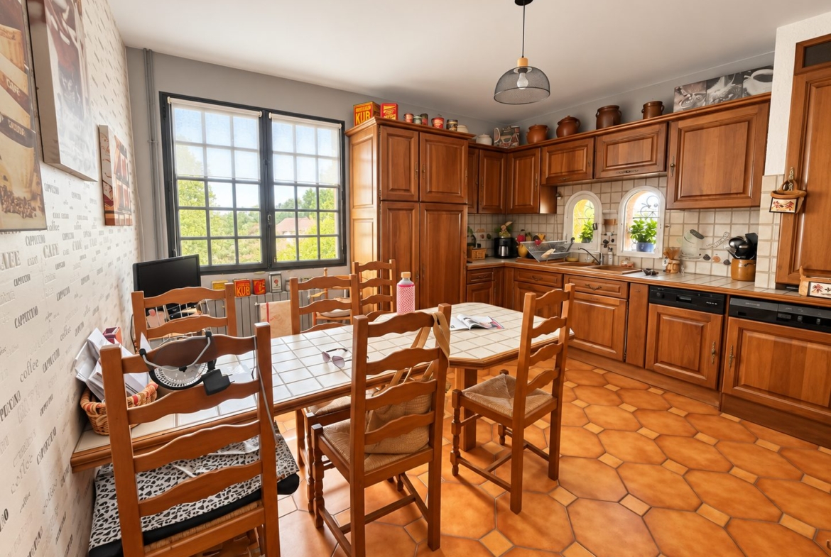 Maison de deux appartements avec terrain à bâtir de 500 m²