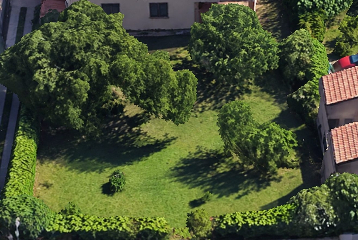 Maison de deux appartements avec terrain à bâtir de 500 m²